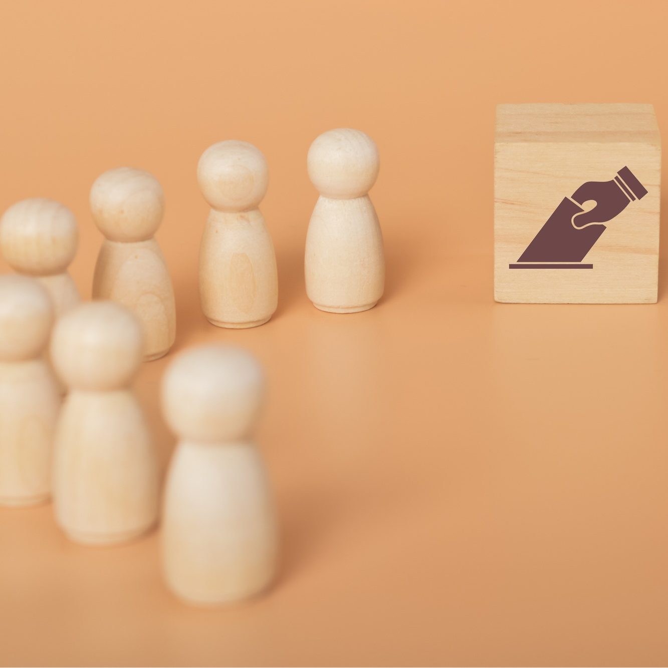 People stood in a queue, patiently waiting for their turn to participate in the voting process.