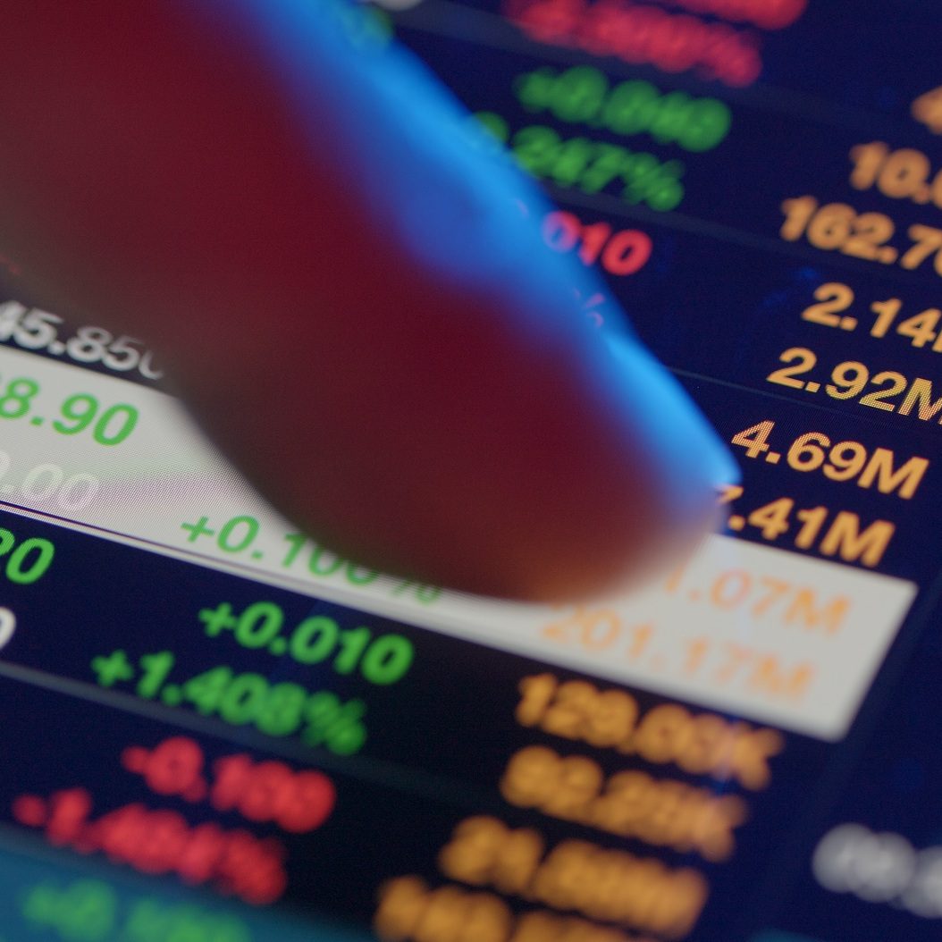 Stock market analysis on digital tablet